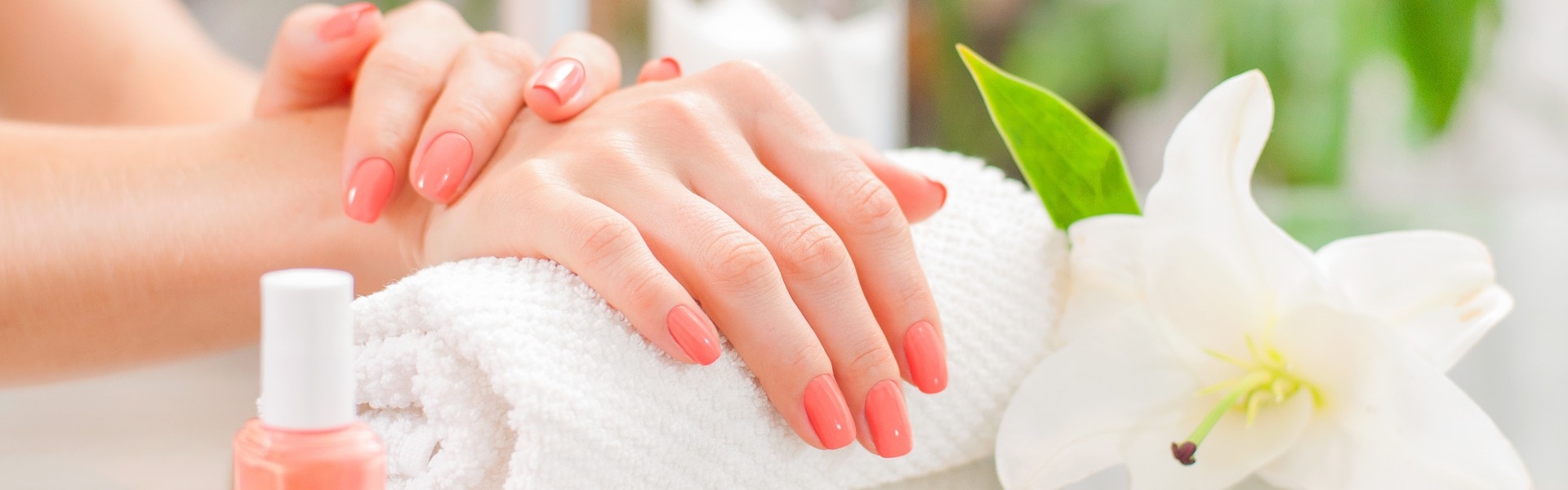 Manicure concept. Beautiful woman's hands with perfect manicure at  beauty salon.
